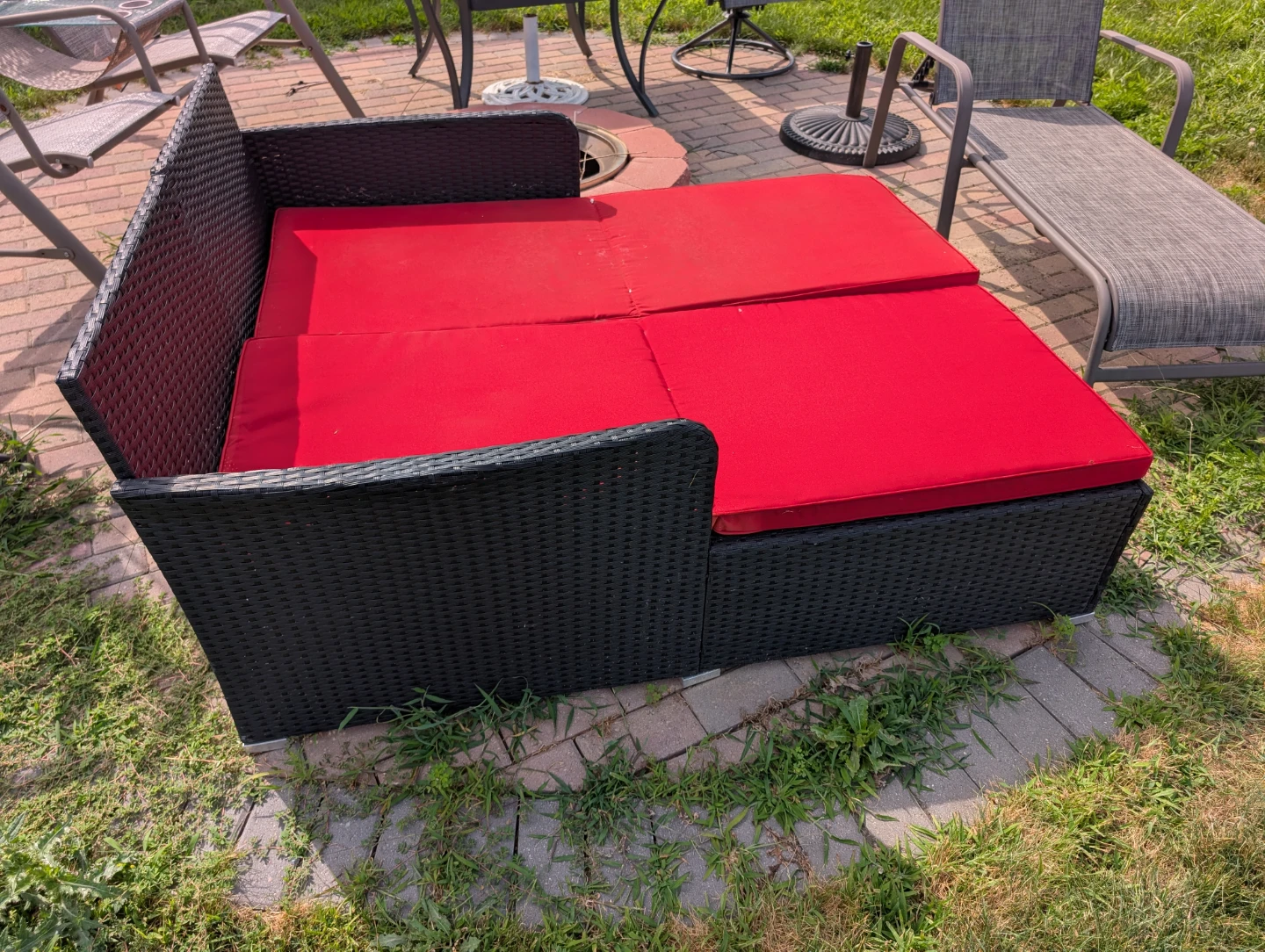 Black Wicker Outdoor Daybed with Red Cushions