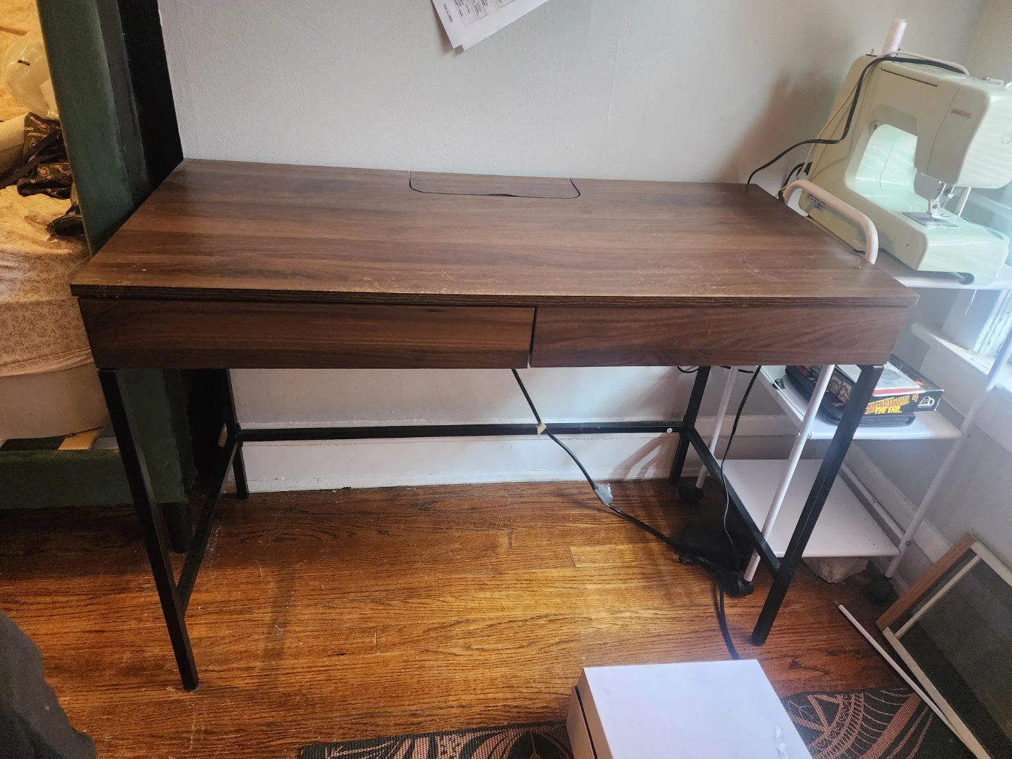 Desk with built in electric outlets.