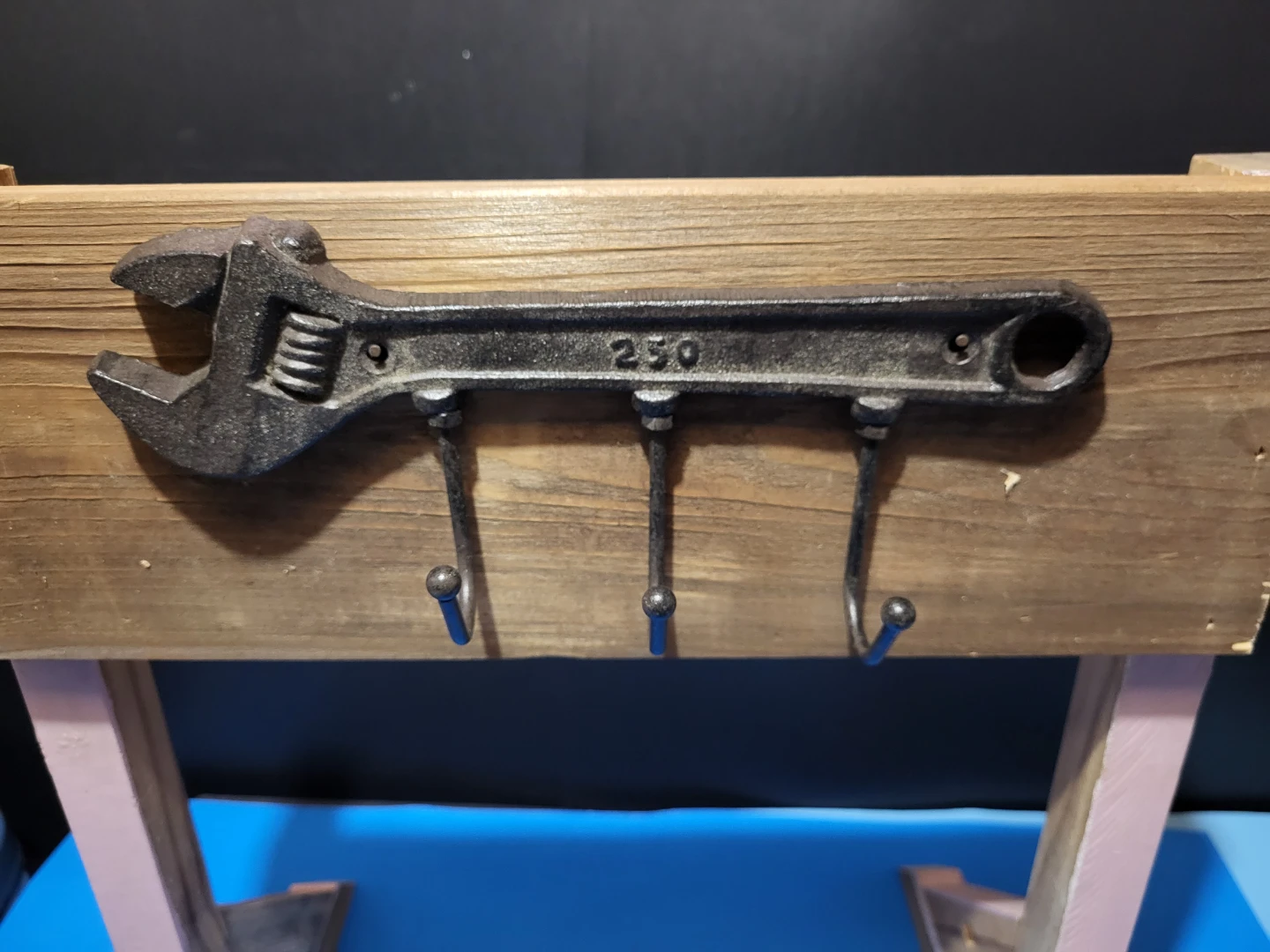Wrench shaped wall hook