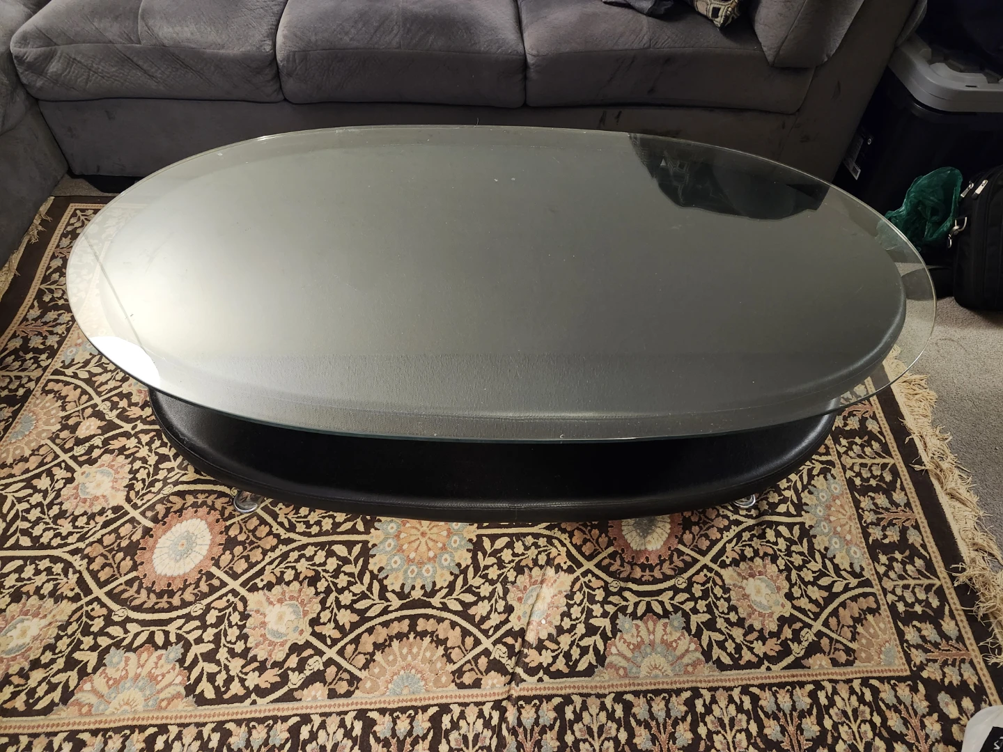 Oval Glass Coffee Table with Black Base