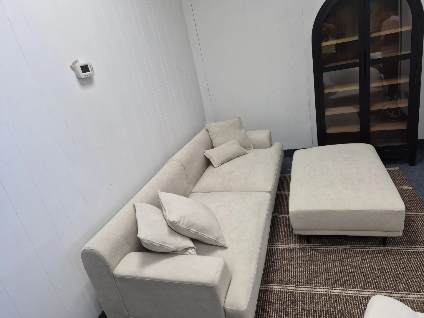 Light Beige Sectional Sofa with Ottoman