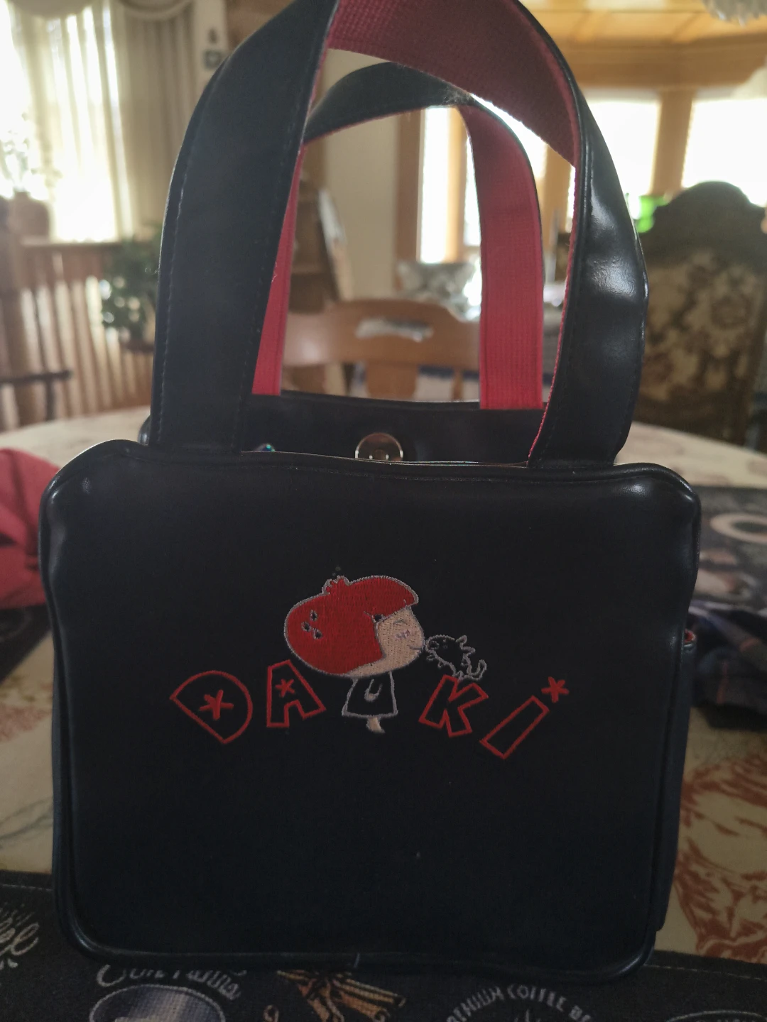 Black "DAKI" Mini Tote Bag with Red Accents