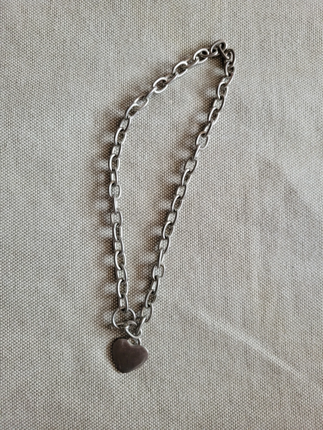 Silver-tone chain necklace with heart pendant