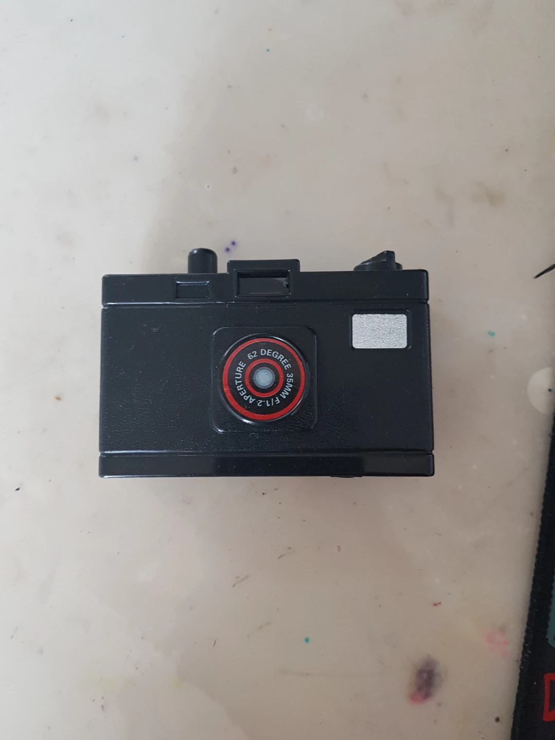 Black squirt camera