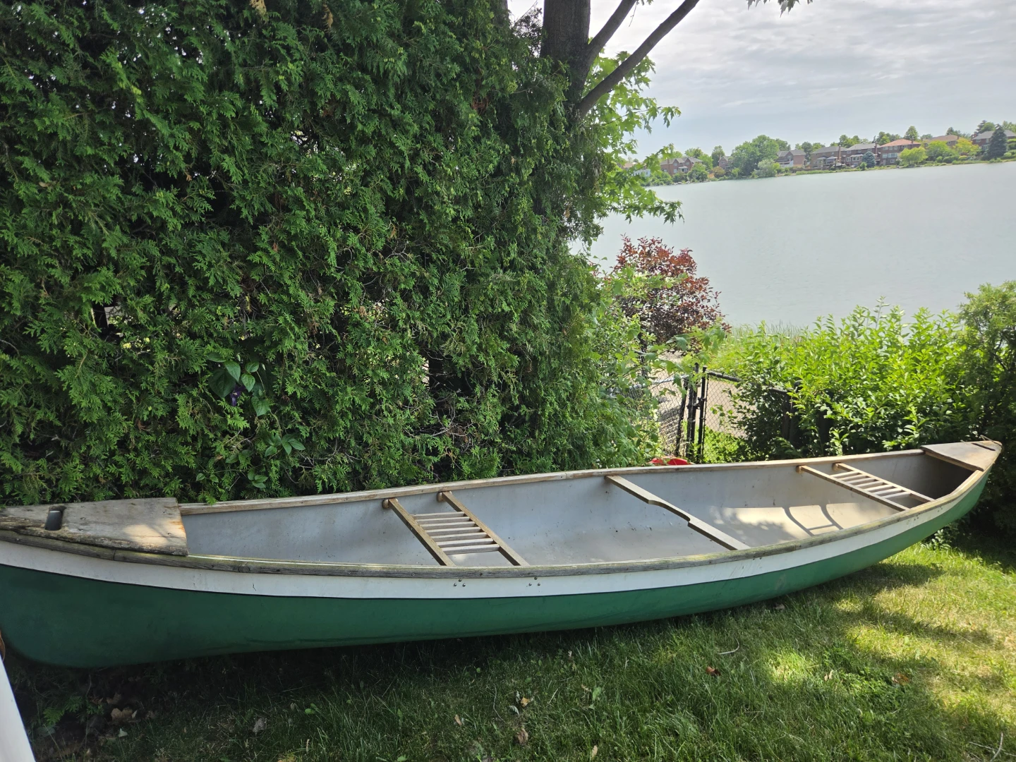 Green and White Canoe