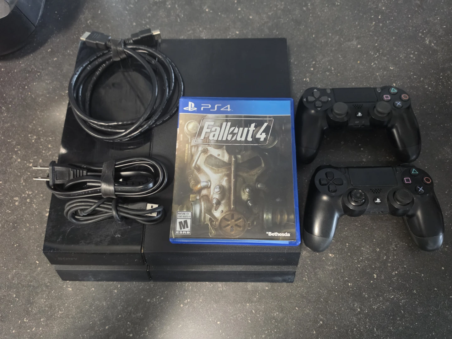 PlayStation 4 Console with Two Controllers and Fallout 4 Game