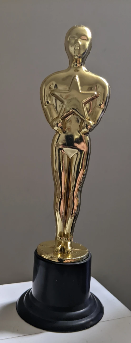 Small coloured trophy statue