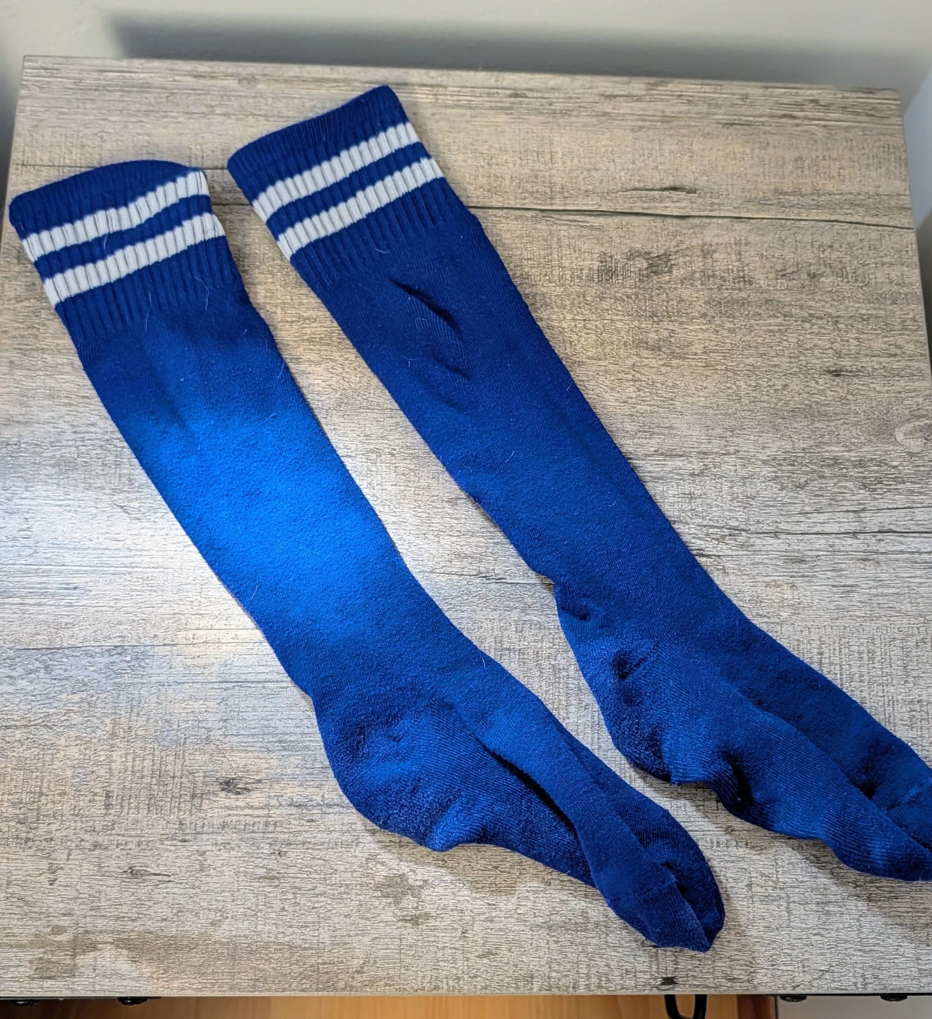 Blue Knee-High Soccer Socks with White Stripes
