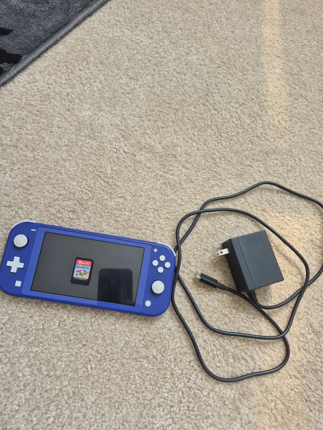 Nintendo Switch Lite - Blue with a minecraft game card
