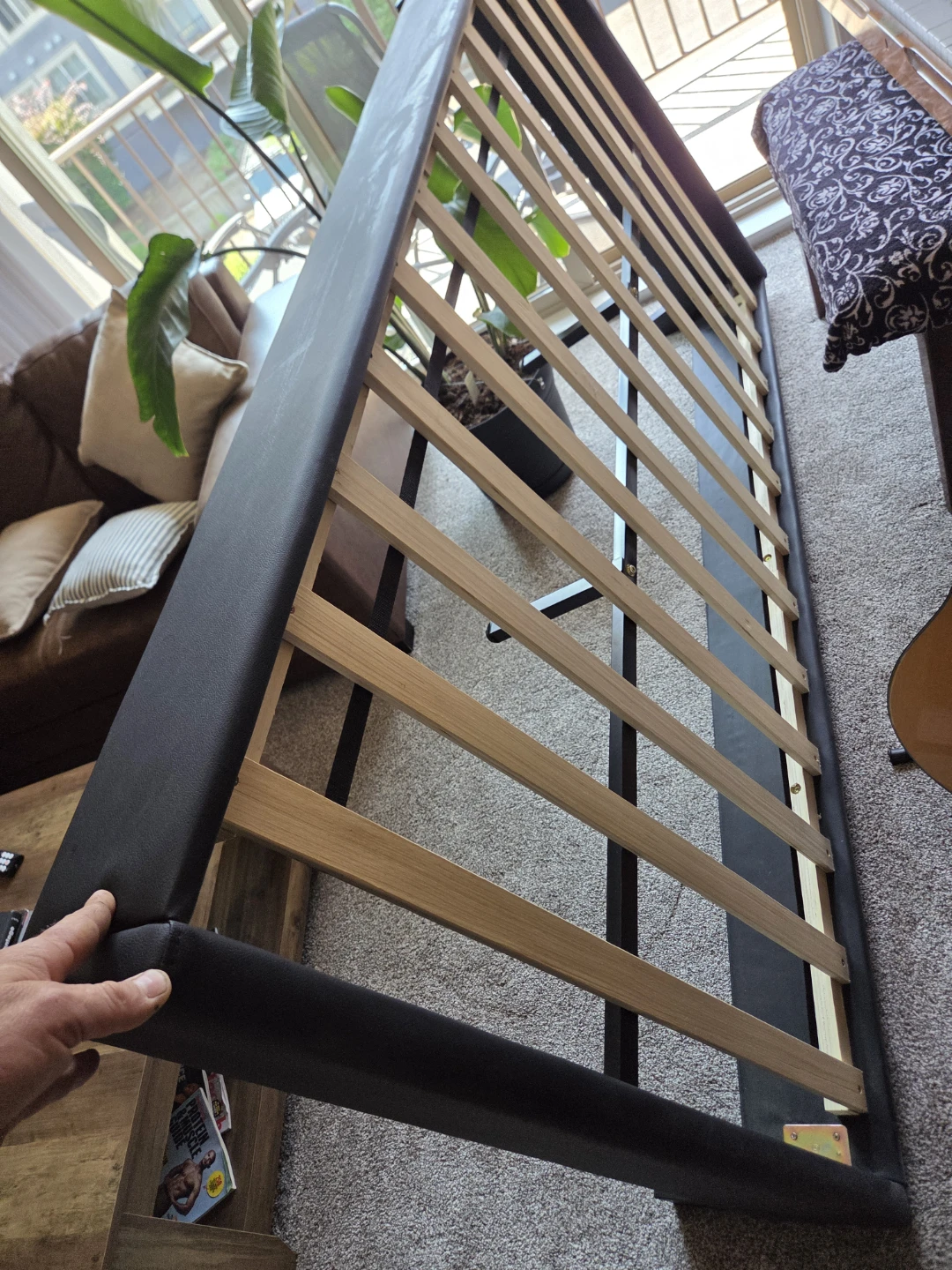 Black Upholstered Bed Frame with Wooden Slats