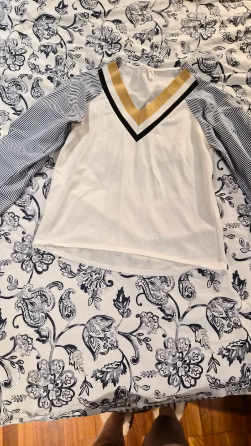 White long-sleeve top with striped sleeves