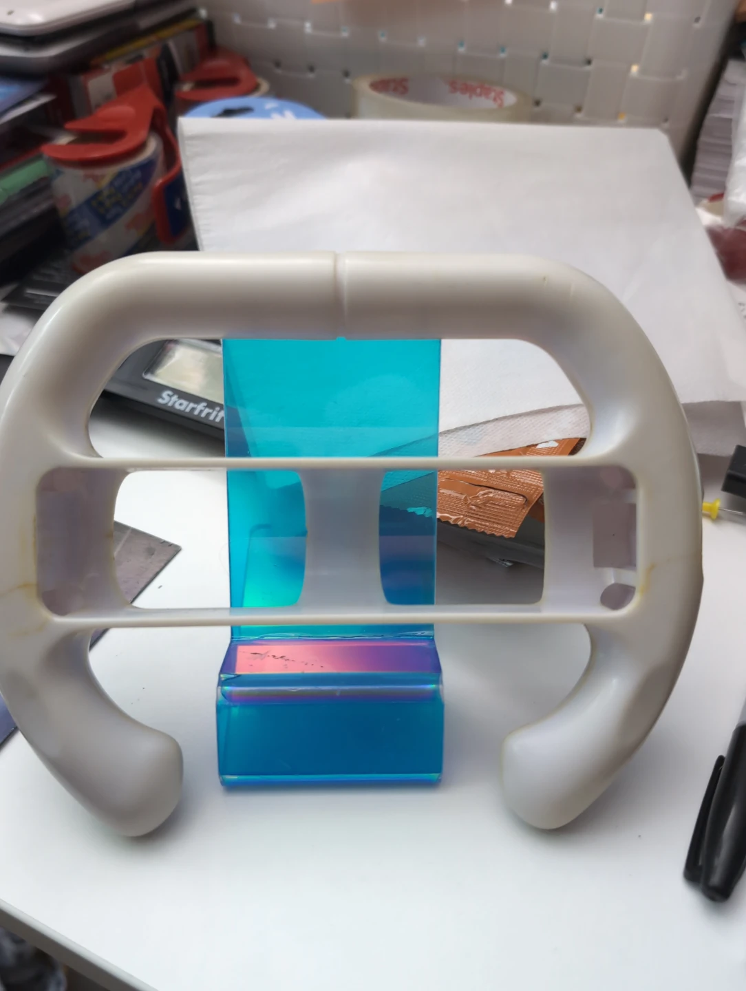 White gaming steering wheel accessory