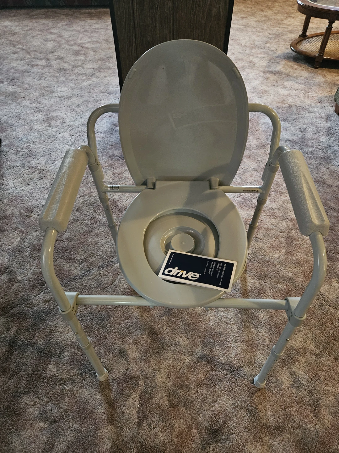 Drive folding steel commode