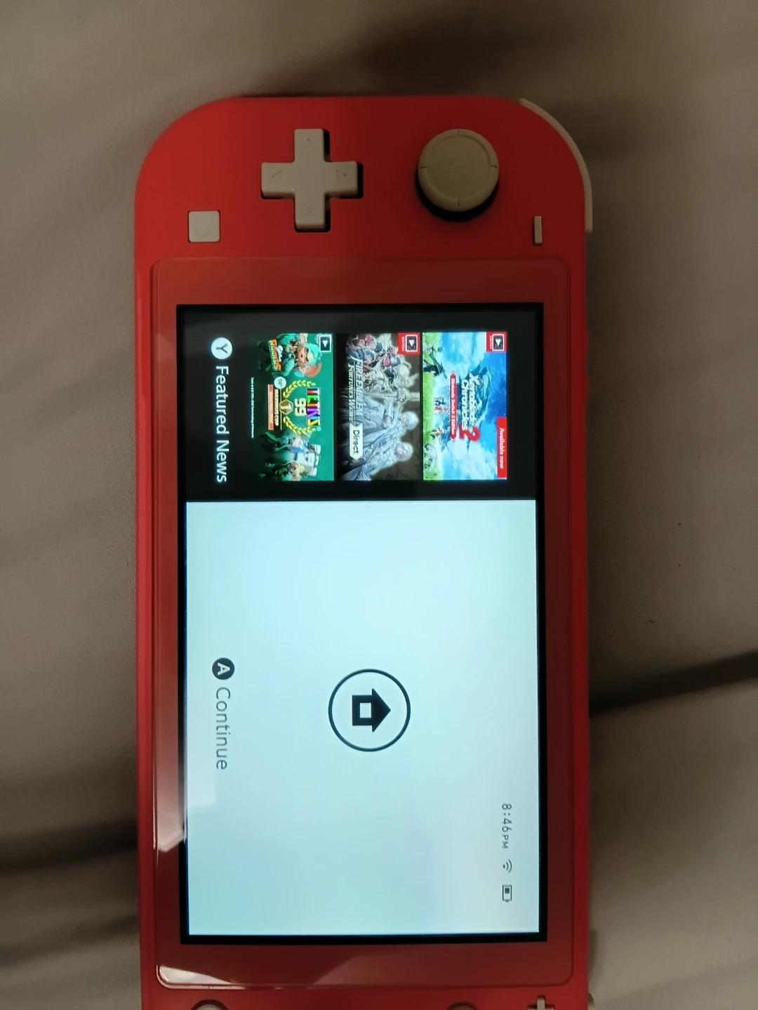 Coral Nintendo Switch Lite with Carrying Case