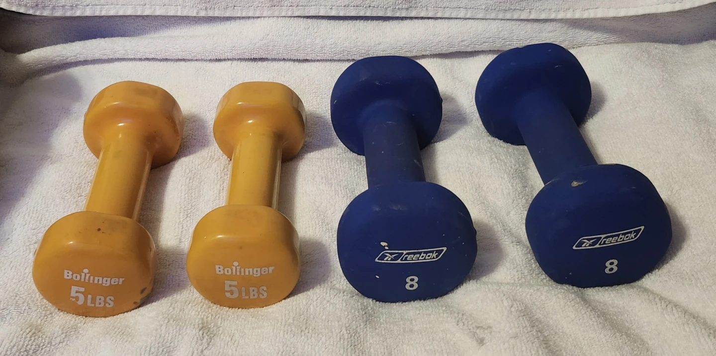 2 5lbs Boilinger dumbbells and 2 8lbs Reebok dumbbells