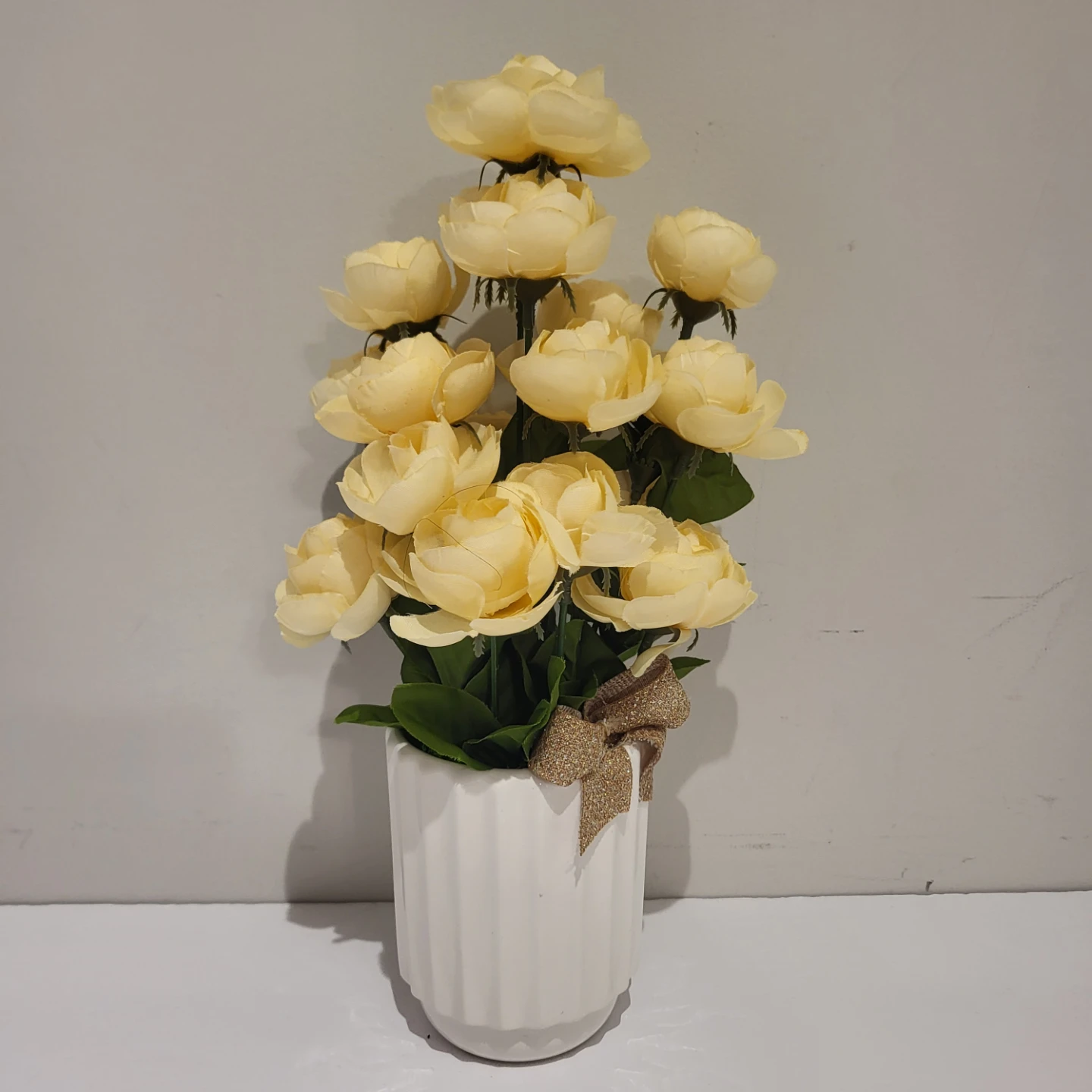 Yellow Faux Rose Arrangement in White Vase