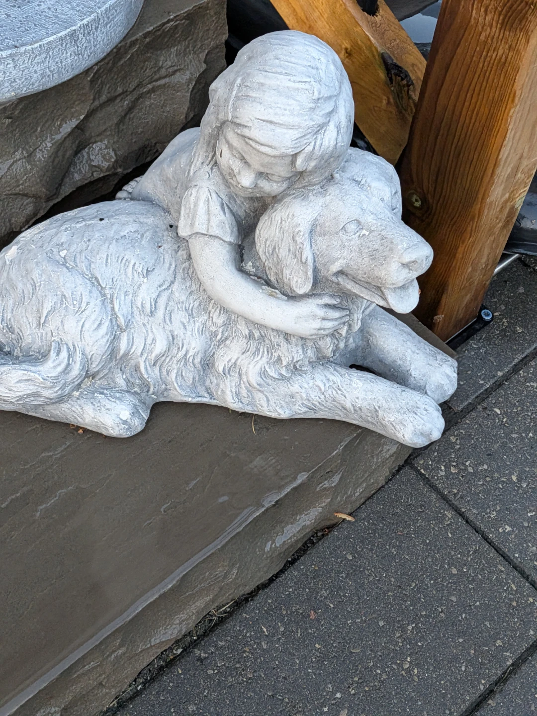 Girl Hugging Dog Statue