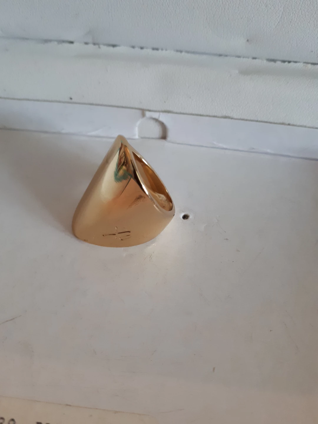 Gold coloured statement ring