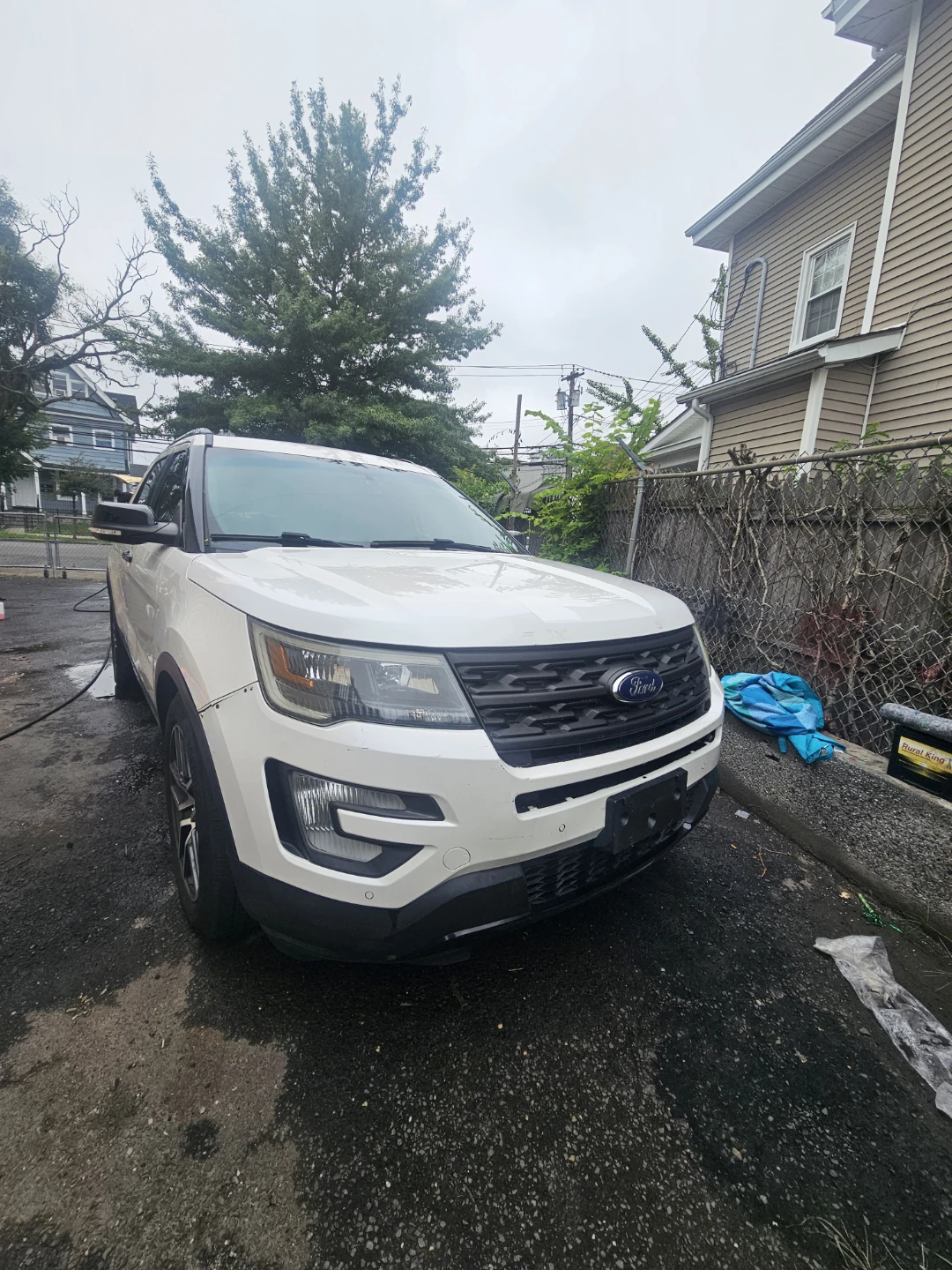 White Ford Explorer SUV - photo 2