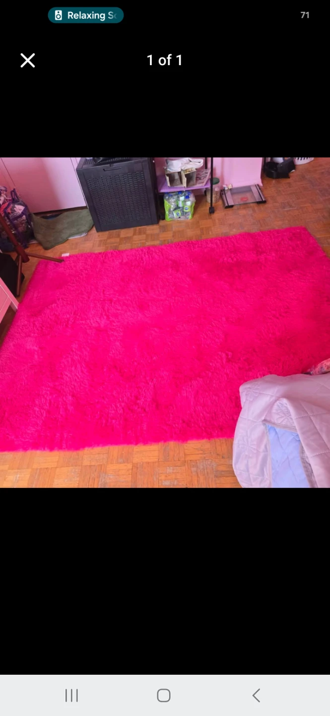 Fluffy rose pink rug.