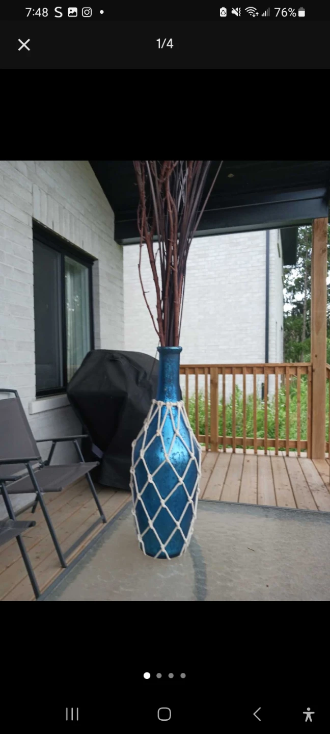 Blue Glass Vase with Twigs and Netting