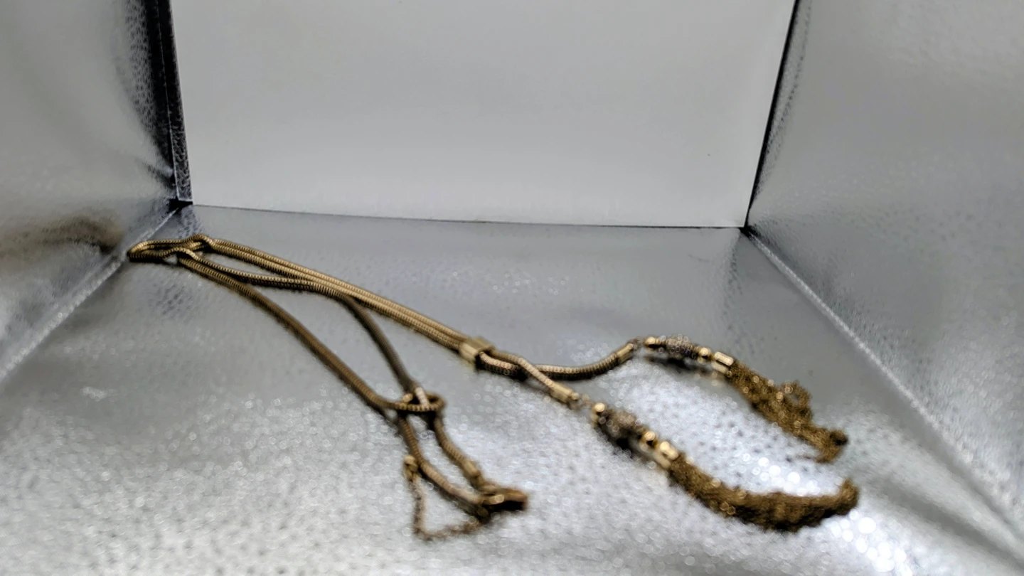 Gold-tone necklace with tassel ends - photo 2