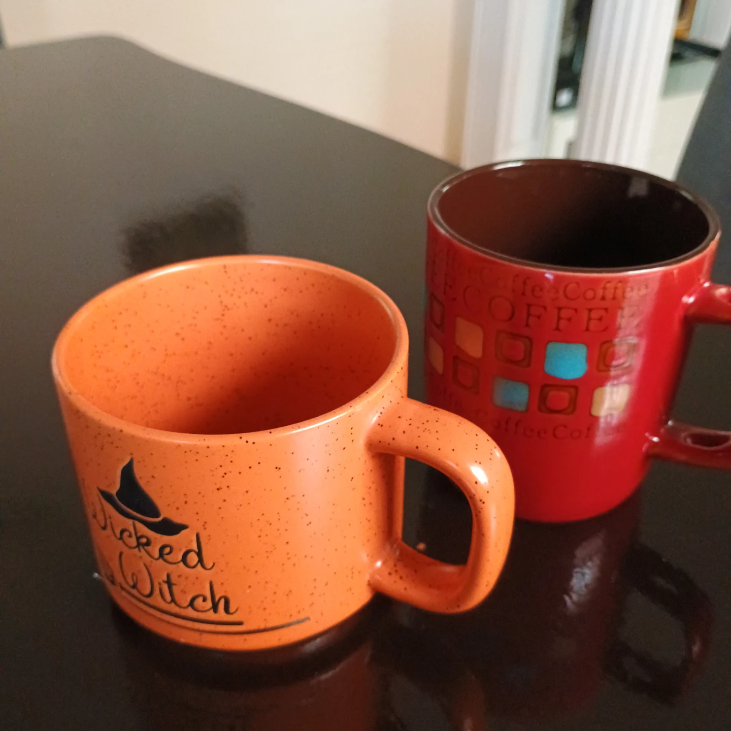 Brown and red coffee cups