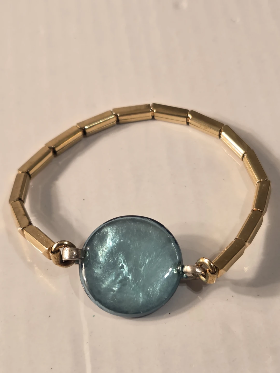 Gold-filled bracelet with blue mother of pearl bid bead