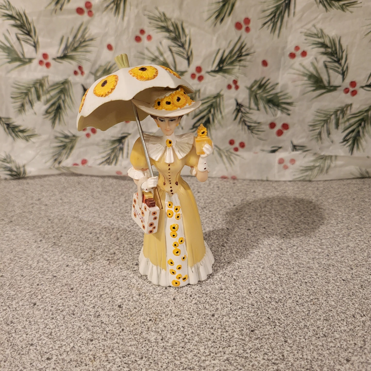 Avon miniature Lady Figurine with Umbrella