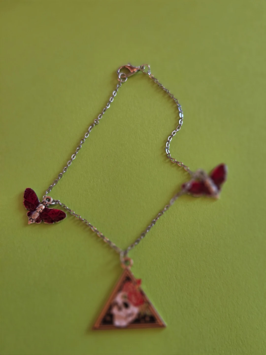 Chain Bracelet with Red death moths and Skull Charm