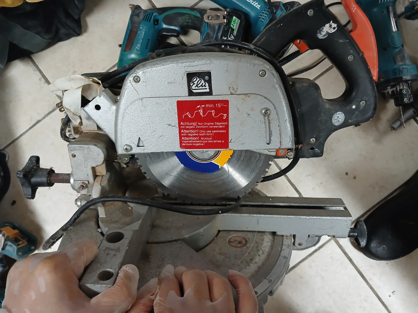 Dewalt Miter Saw with Makita Battery and Charger