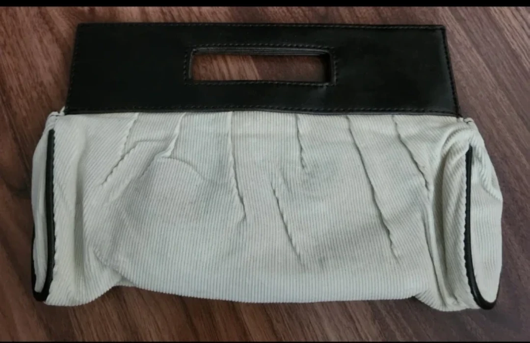 Clutch handbag with floral accent and removable strap - photo 2