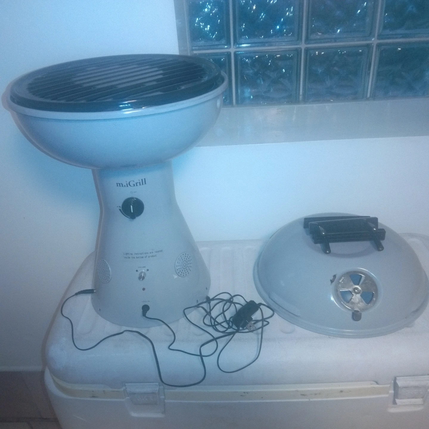 Small grill with telephone outlet