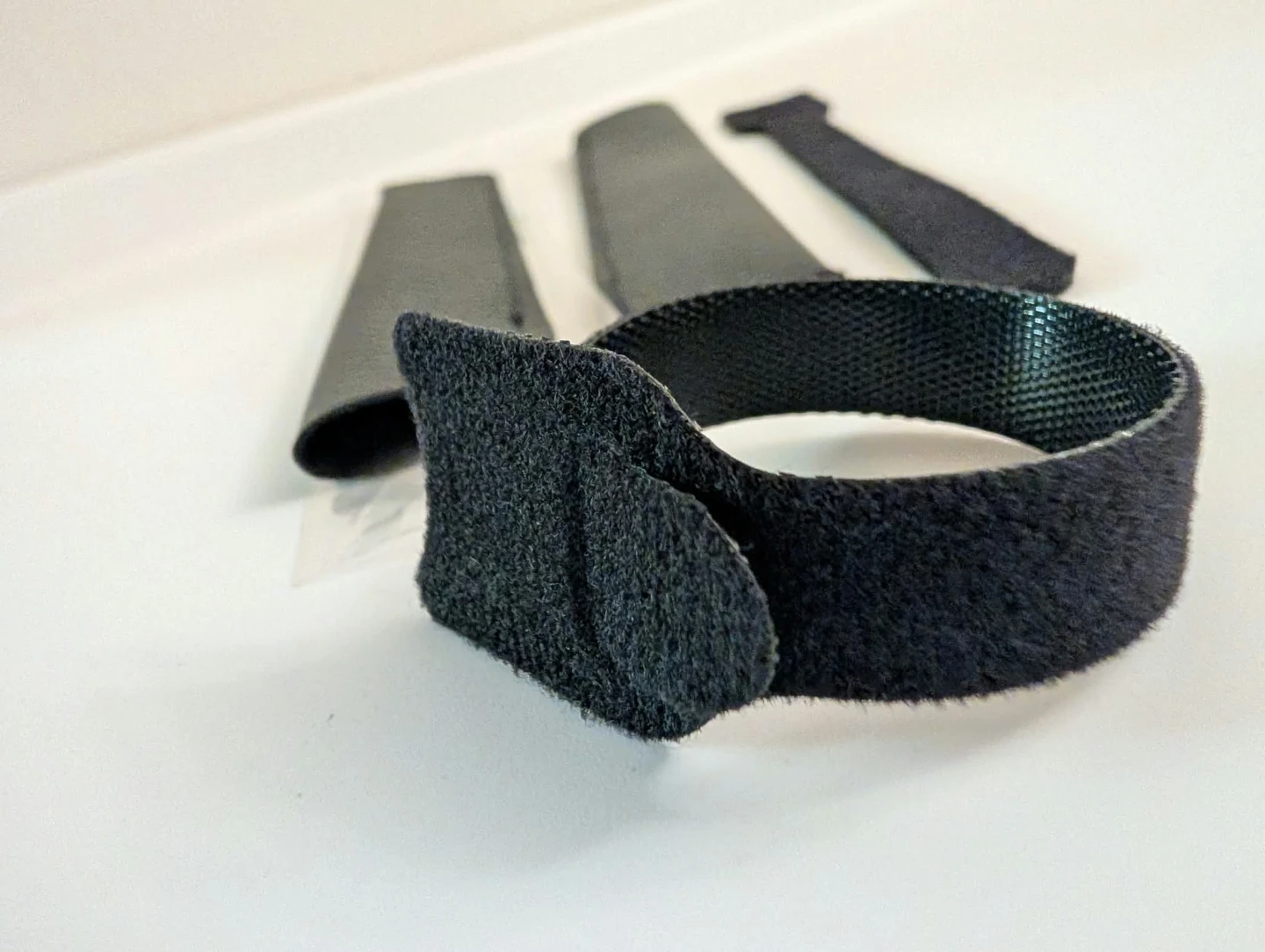 Black stylus pouches and cable organizers - photo 2