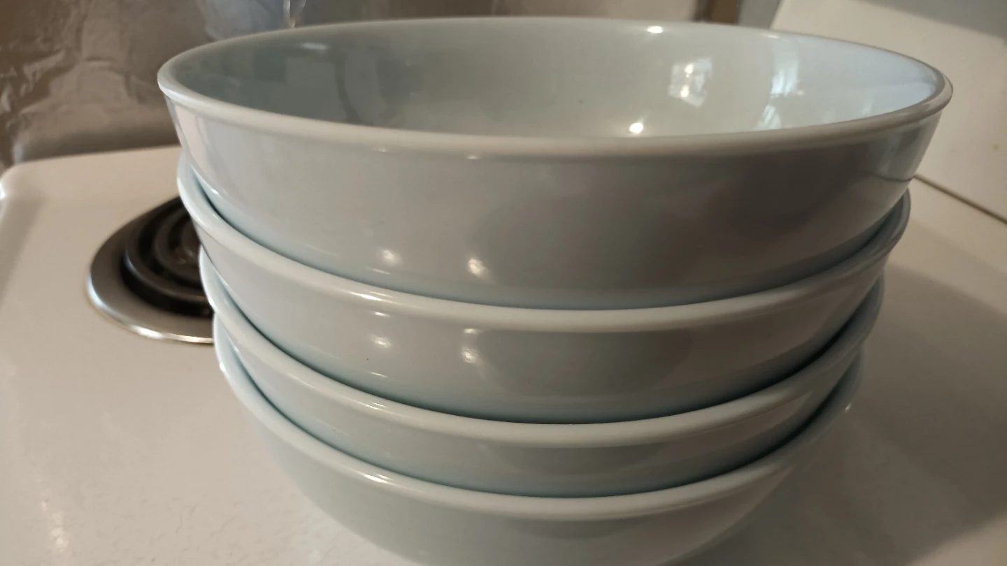 Stack of 4 White Ceramic Bowls
