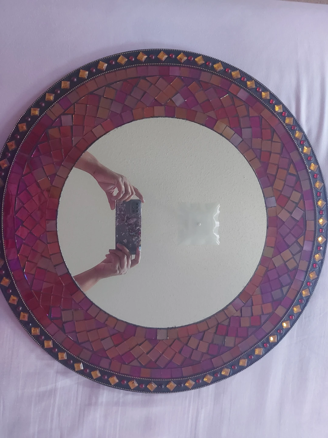 Hand made mosaic mirror .