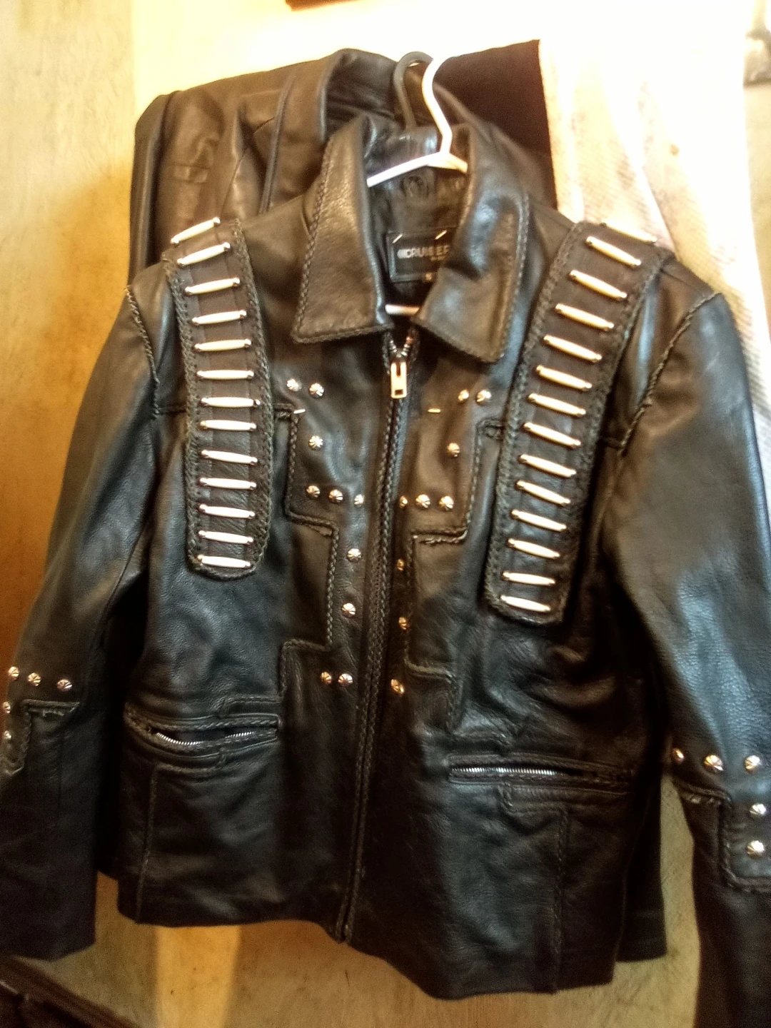 Black Leather Jacket with Studs and Straps
