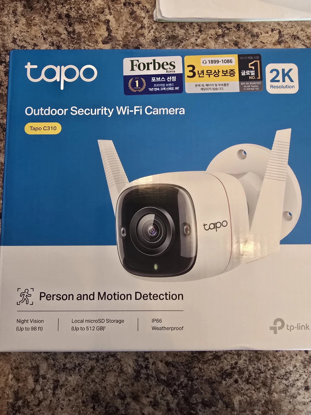 Two TP-Link Tapo C310 outdoor Wi-Fi security cameras for sale.