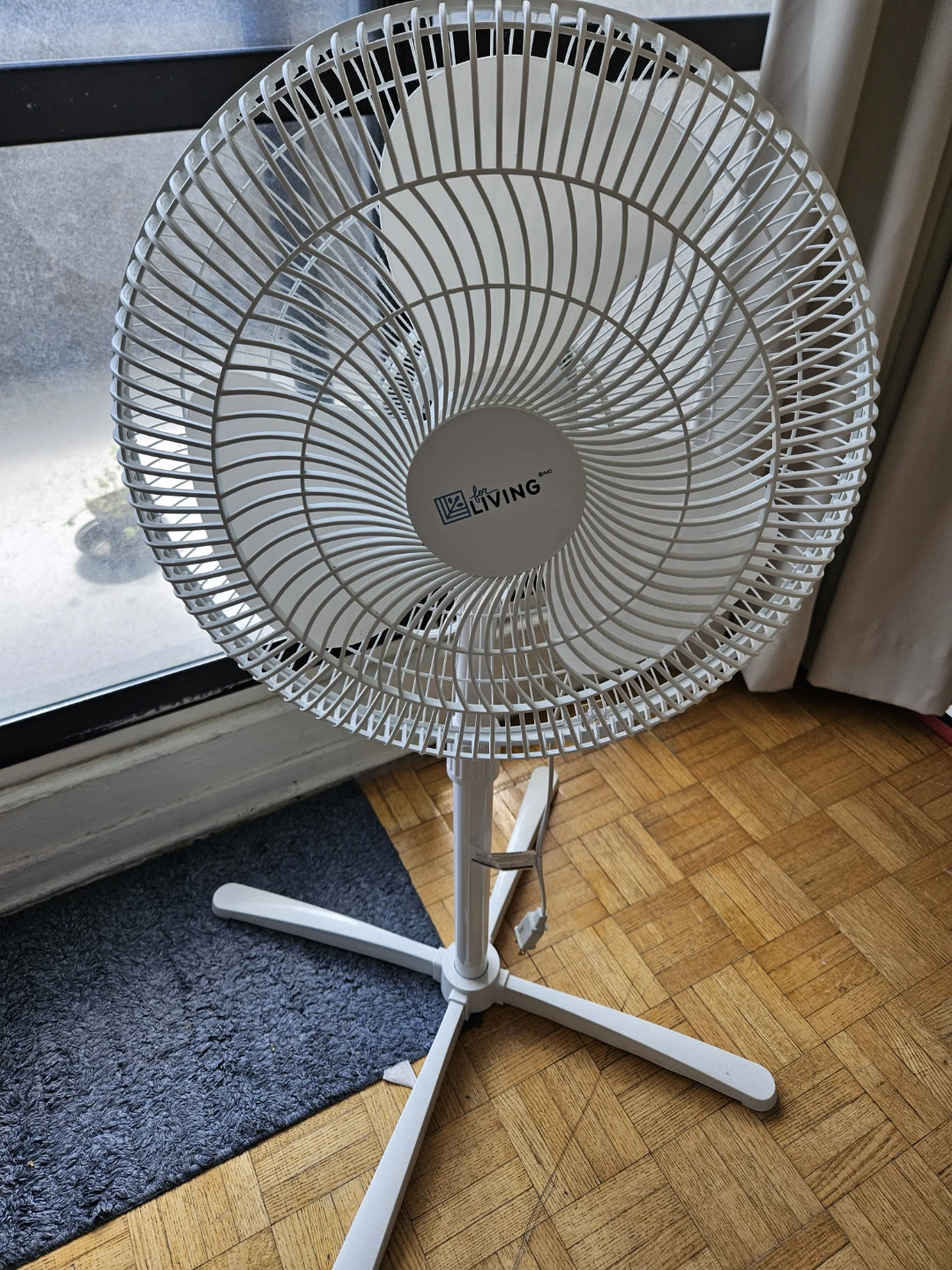 Living electric stand fan