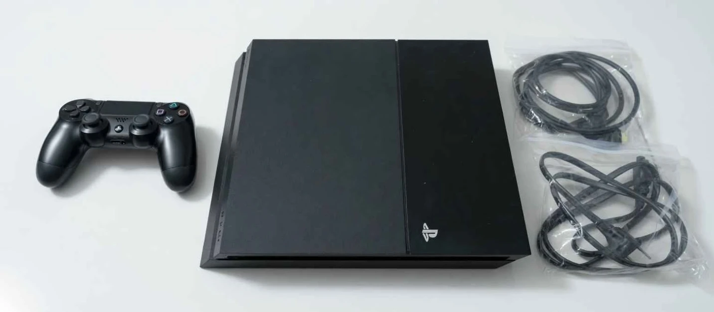 Sony PlayStation 4 Console with Games and Controller