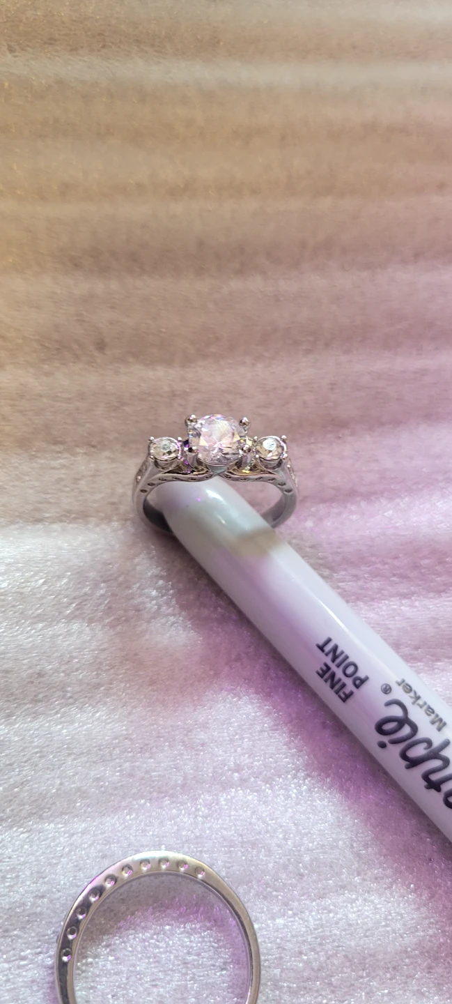 Silver-tone ring with clear stones