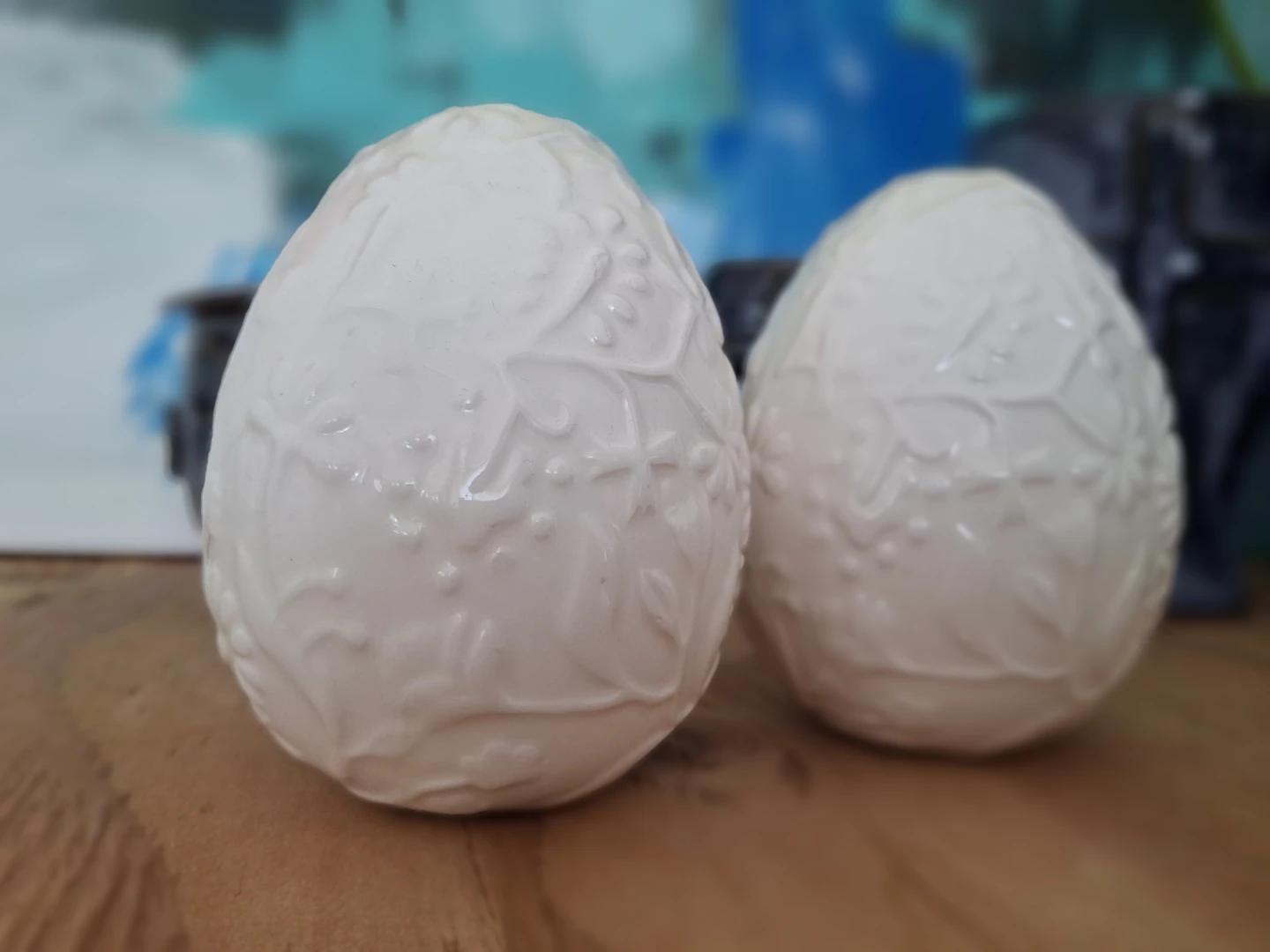 Two White Ceramic Embossed Egg Decorations