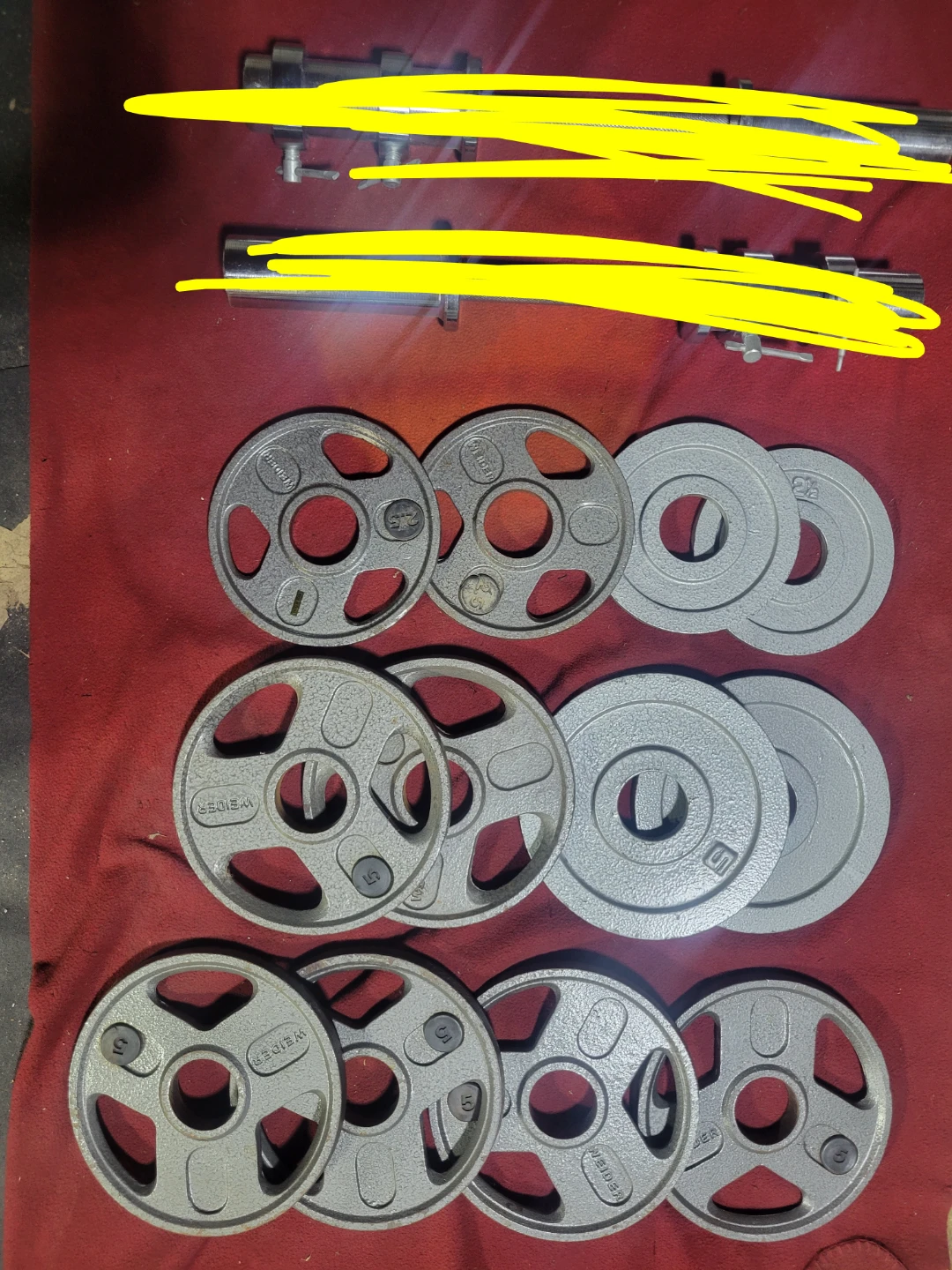 OLYMPIC 2" HOLE.  PLATES 50LBs.