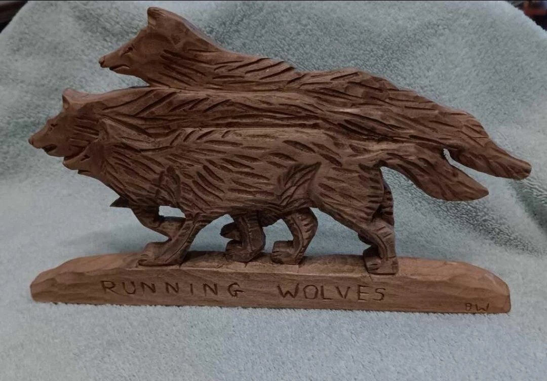 Hand-carved Running Wolves Wood Sculpture - photo 4