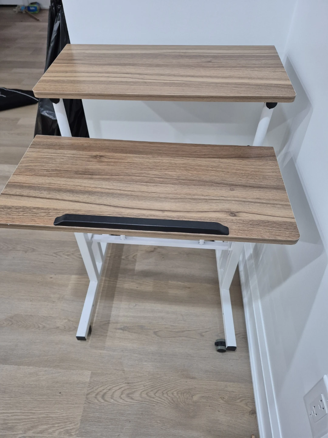 Two-tier mobile standing desk with wheels