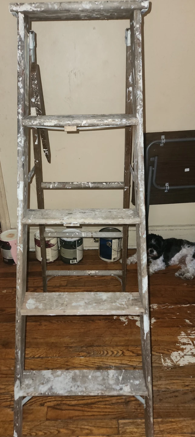 Used 5-foot wooden step ladder