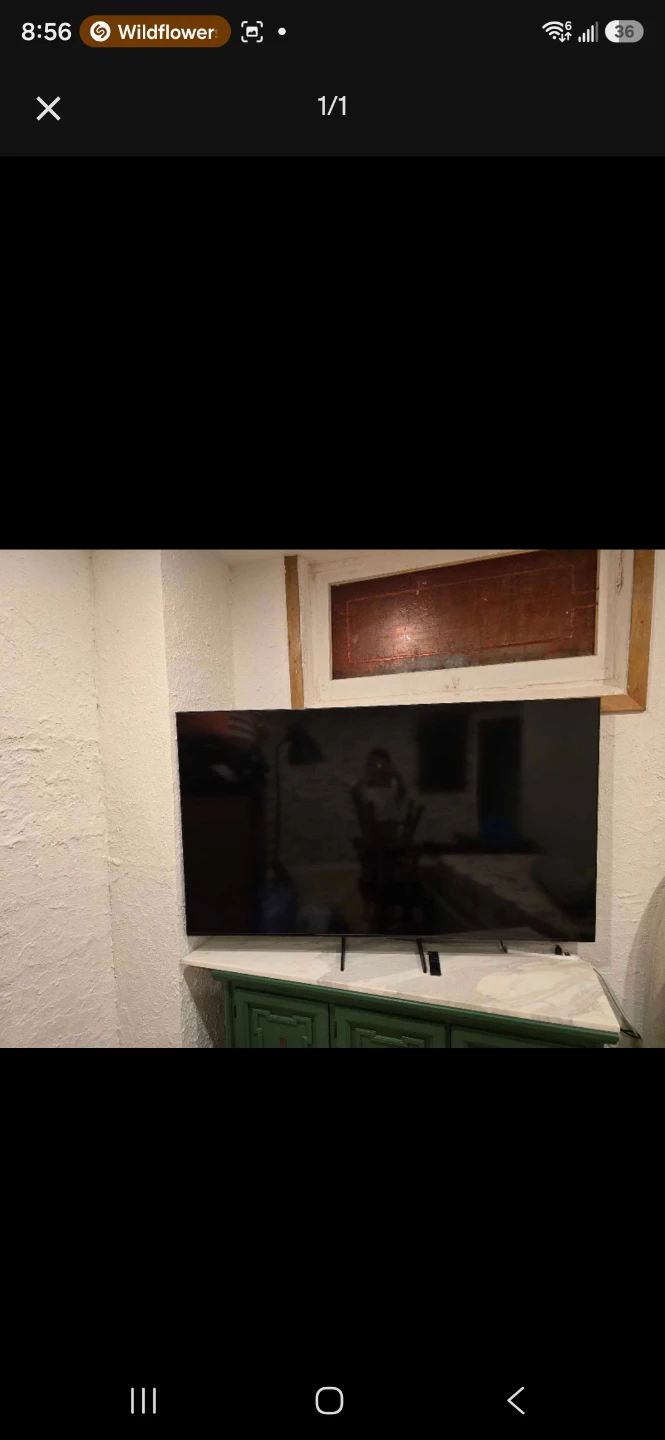 Black flat-screen TV