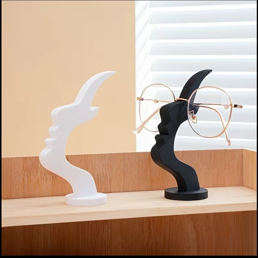 2 Sculptural Face Eyeglass Holder Stands