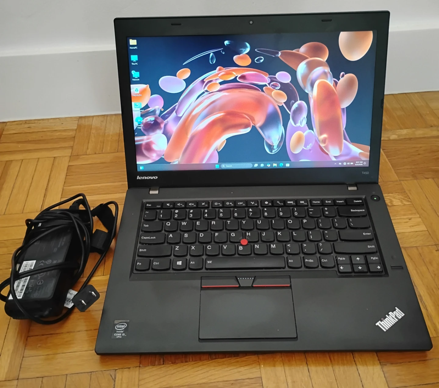 Windows 11 laptop Lenovo ThinkPad T450 with charger