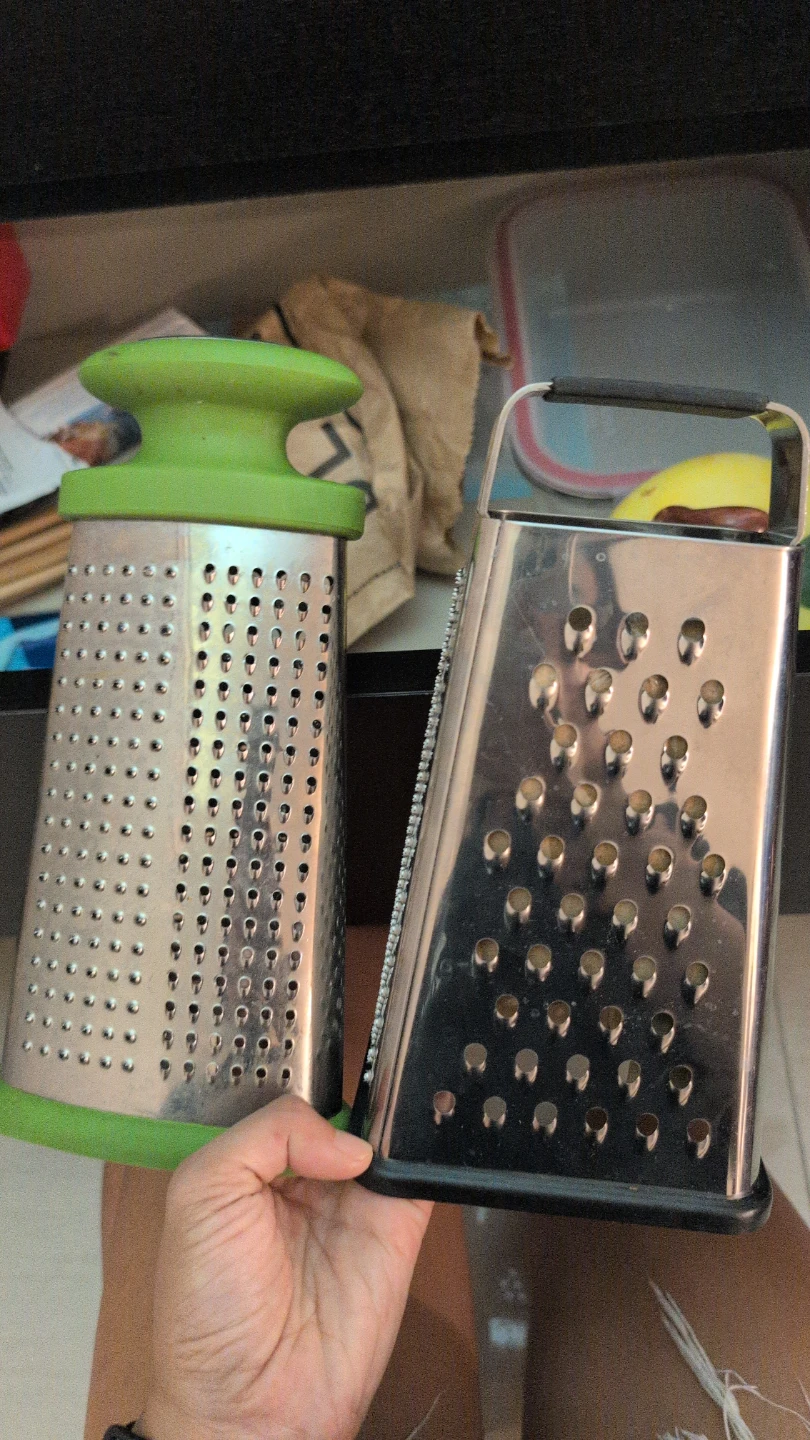 Two Graters: Cylinder with Green Handle & Box Grater